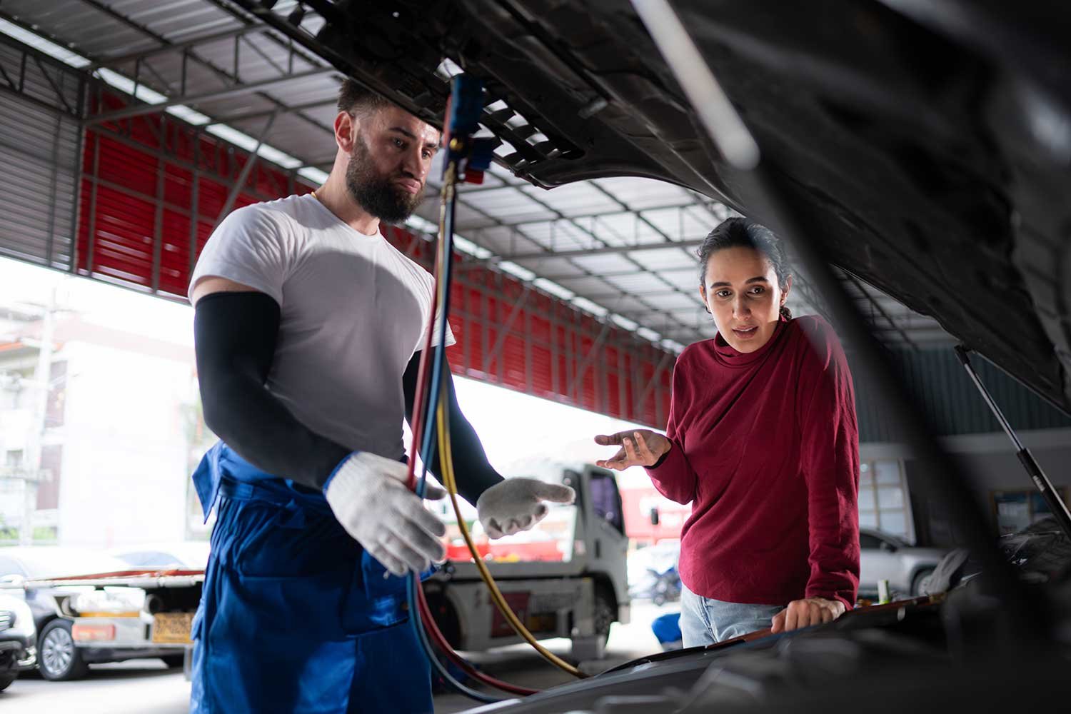 worker-cleaning-automobile-air-conditioner-vent-gr